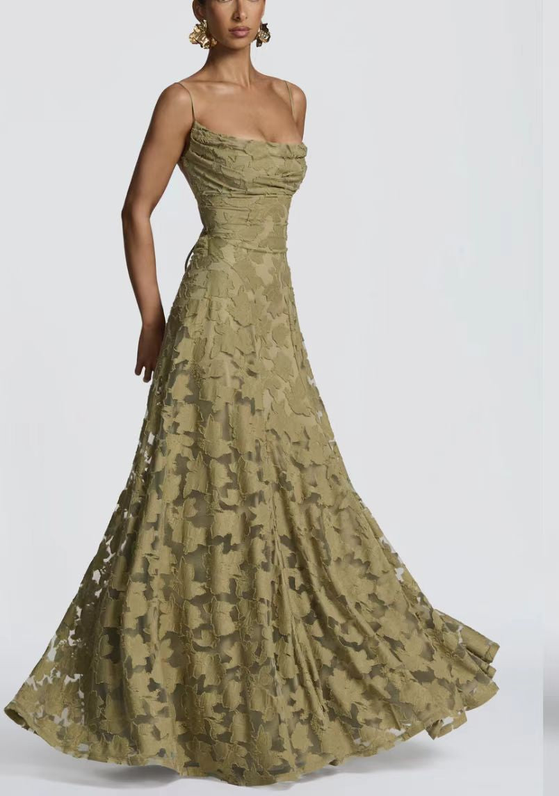 Woman wearing a green floral gown 