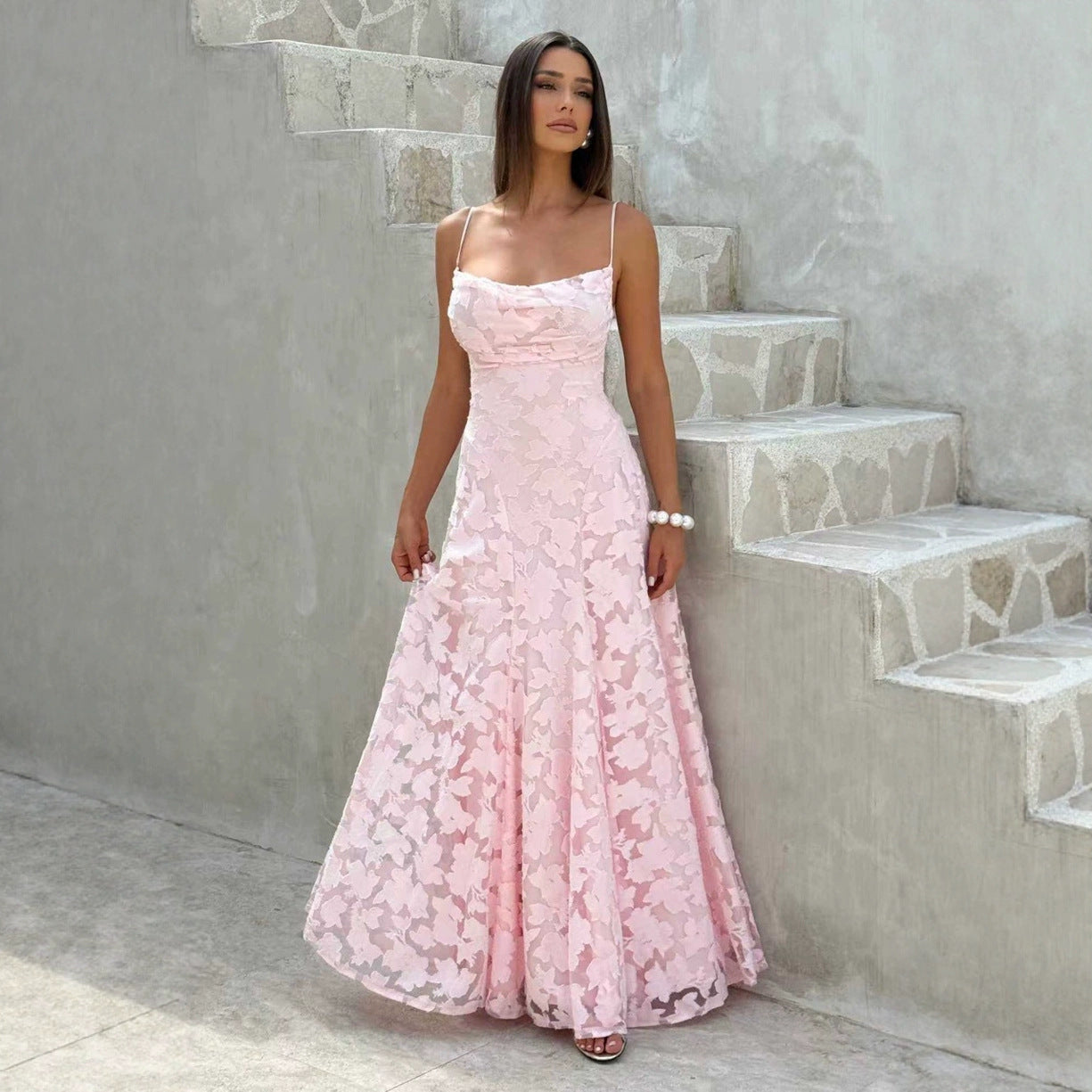 Woman in a pink floral dress